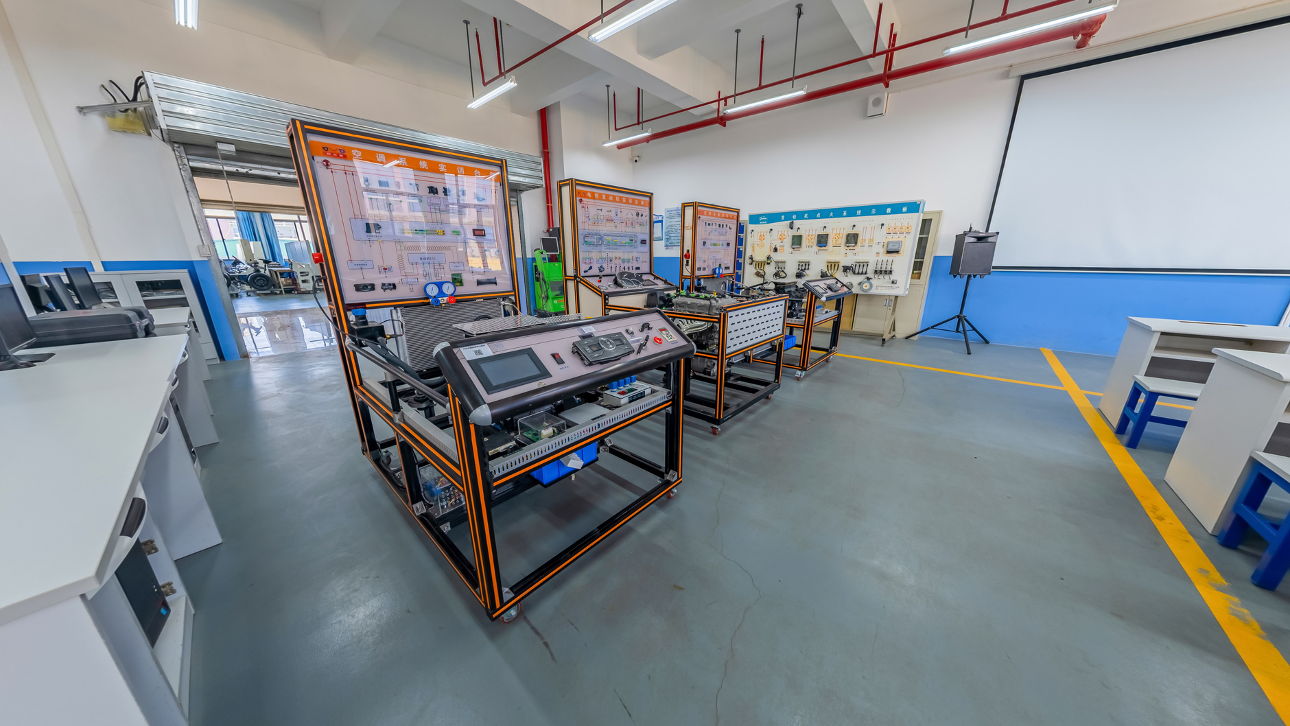 Training lab with engine equipment and desks